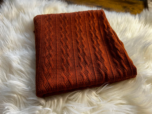 Rust cable knit