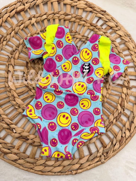 Neon smiley faces